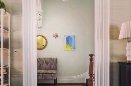 Simple yet elegant custom armless banquette bench seating with tapered wooden legs, designed by Bespoke by Luigi Gentile. Interiors: Laura Stern Design