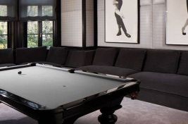 Incredible wrap around custom Beekman sectional with loose seat cushions and back pillows for a modern styled game room. Upholstery by Bespoke by Luigi Gentile