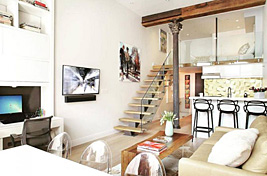 Beautiful custom upholstered sofa with loose seat and back cushions by Bespoke by Luigi Gentile. Interiors: Rona Landman. Photography: Robert Granof