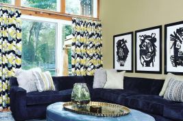 Custom upholstered Beekman sectional in blue velvet and Rowe Ottoman Table with a light tufted top. designed by Bespoke By Luigi Gentile. Interiors by Evelyn Benatar.