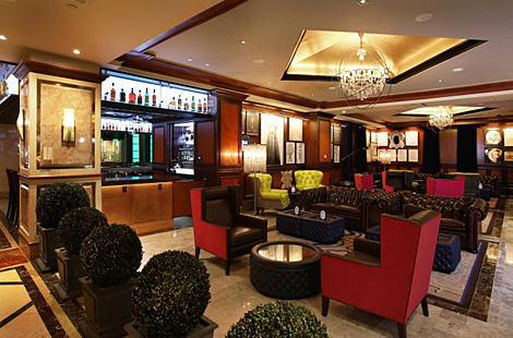 Hospitality project for Harrah's Resort in Atlantic City featuring our custom Watts Chesterfield sofas, upholstered club chairs and tufted ottoman tables to add to the comfortable yet eclectic style. Upholstery: Bespoke by Luigi Gentile.