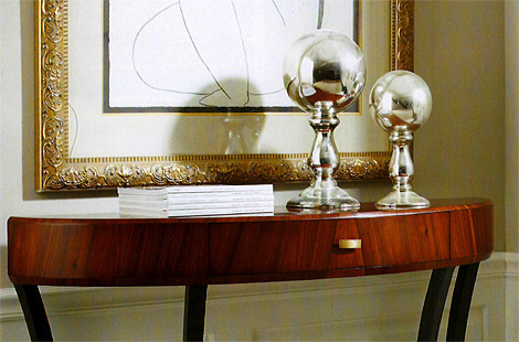 Custom foyer console with single drawer front in walnut finish and tapered legs.  Designed by Bespoke by Luigi Gentile