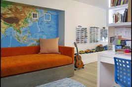 A fabulous custom upholstered bench with a wooden storage drawer for a boys room created by Bespoke by Luigi Gentile. Designer: Rona Landman