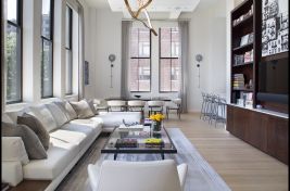 Elegant custom left arm facing L shaped sectional with wooden drink table and blackened steel metal coffee table with glass top created by Bespoke for designer, Rona Landman. 