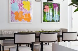 Custom live edge wood kitchen table with bespoke metal base.Designer: Rona Landman Table: Bespoke by LG