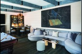 Our custom Ballard Sectional with plenty of seating and inset drink trays made for a fabulous bar and game room by Robyn Karp designs. \r\nUpholstery: Bespoke by LG