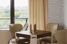 Elegant corner dining table featuring our custom Barclay Armless Dining Chairs. Interiors: Penny Drue Baird/Dessins LLC. Upholstery: Bespoke by Luigi Gentile.