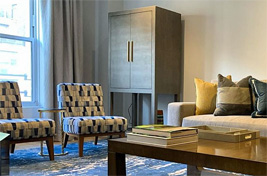 Side view of our incredible Emerson Chairs upholstered in a beautiful textured blue fabric. Interiors: Gale Sitomer. Upholstery: Bespoke by Luigi Gentile.